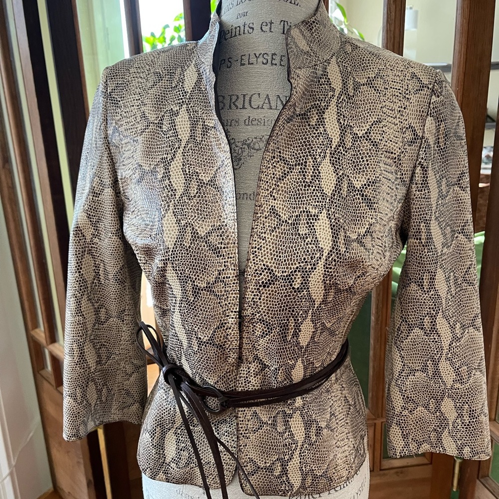 Karen Mullen England  leather jacket, with slim leather belt.